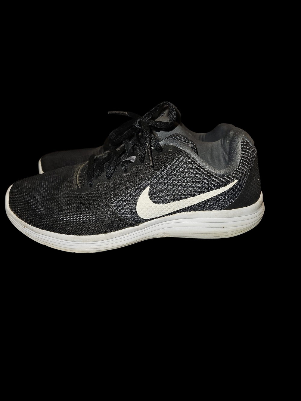 Womans Nike Black and White Running Sneakers